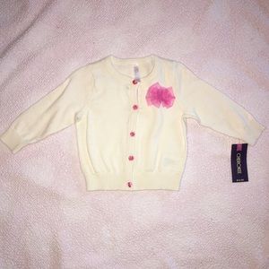 Brand new Cherokee Girls Cardigan. Size 6-9 months