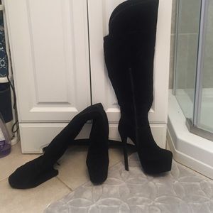 Thigh high heeled boots
