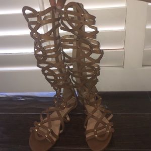 knee high Roman sandals
