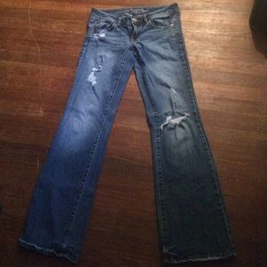Distressed, medium wash jeans