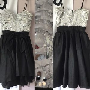 Black and sequin dress with bow