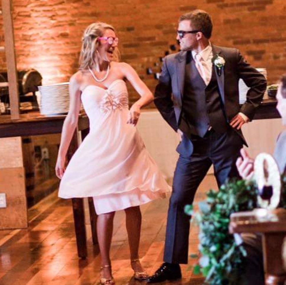 Bill Levkoff bridesmaids dress in light pink.