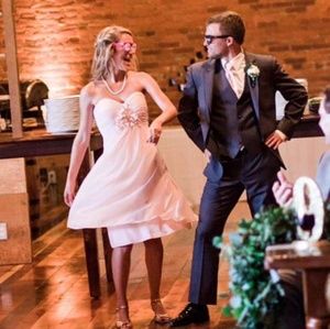 Bill Levkoff bridesmaids dress in light pink.