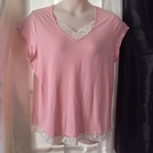 Lace trimmed stretchy top with cap sleeves.