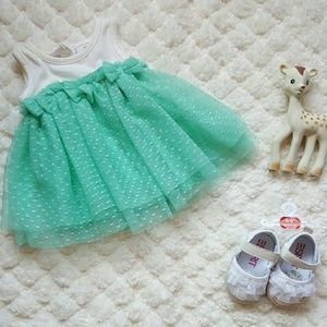 White baby girl shoes with tags still attached