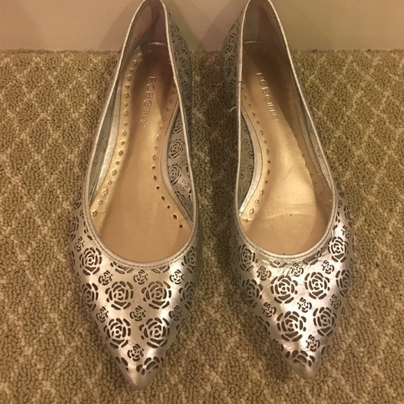 Silver BCBG flats with cutout designs