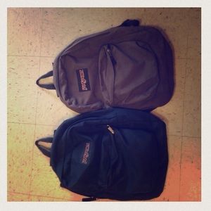 "Jansport" backpacks one dark blue one gray