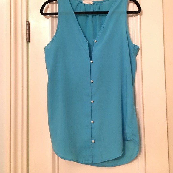 Blue tank with pearl buttons