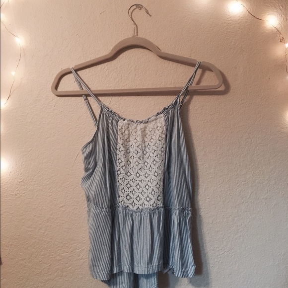 Cute striped camisole with lace front and  peplum.