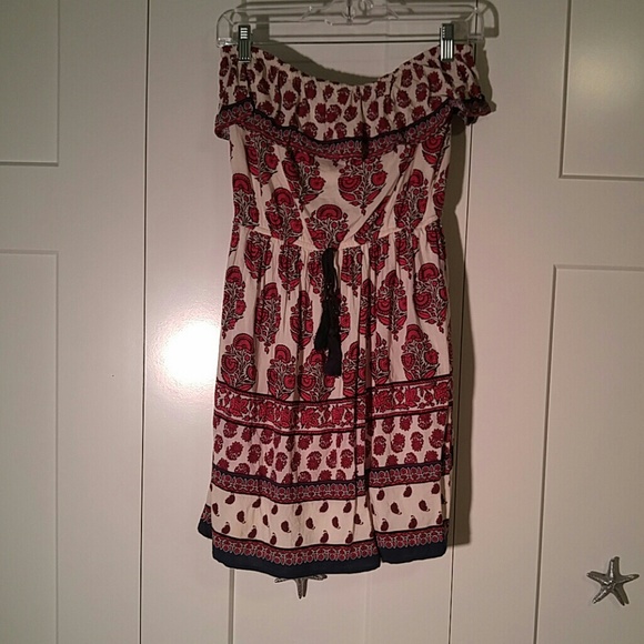 Strapless red and cream dress.