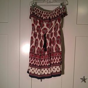 Strapless red and cream dress.