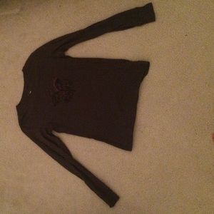 Gray long sleeves tee with the North Face logo