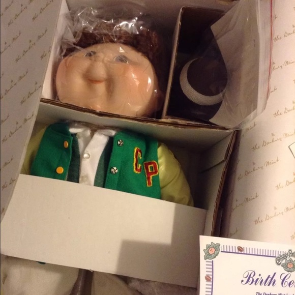 This is a porcelain collectors cabbage patch kid