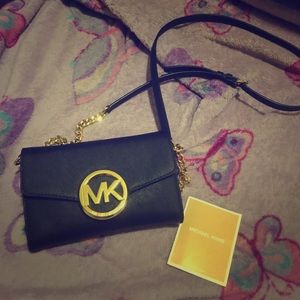 Authentic black mk clutch purse