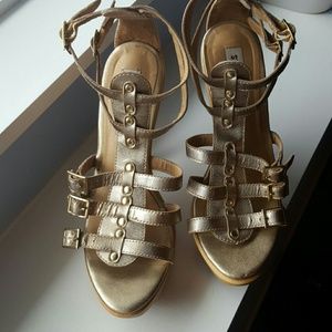 Awesome gold Steve Madden heels.