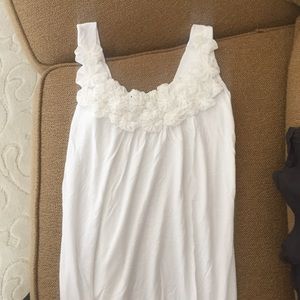 White tank top with plush, flower detailing on top