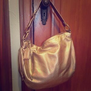 Gold coach shoulder bag