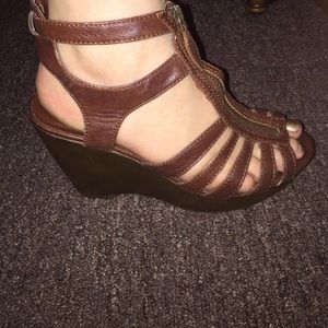 Brown zip up high heels