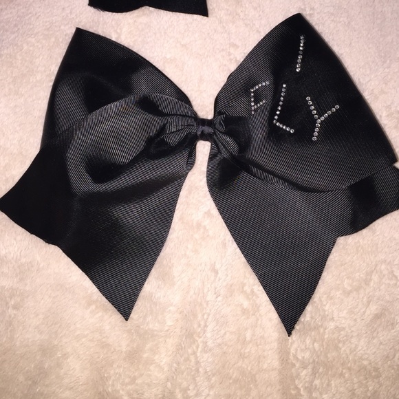 plain black cheer bow says ifly in corner