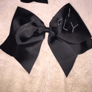 plain black cheer bow says ifly in corner