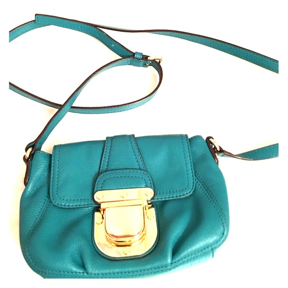 Original Michael Kors dark turquoise.