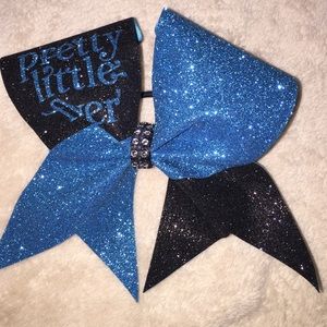 a blue and black cheer bow