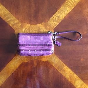 Plum Coach Wristlet (NWOT)