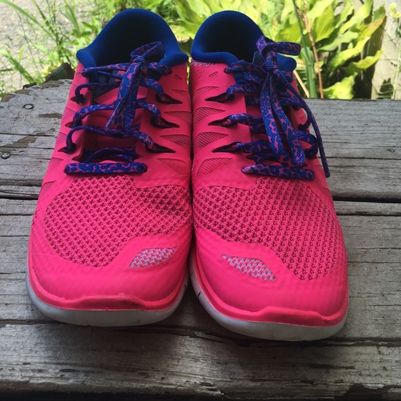Pink and blue nike free 5.0