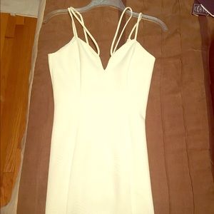 Size 0, bodycon, ivory Guess dress.. Never worn!