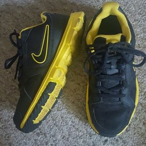 Black and yellow mesh nikes