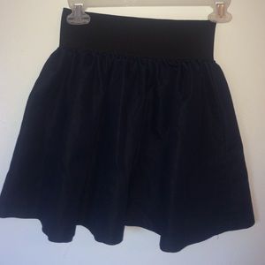 Dark blue skirt!! never worn. size small.