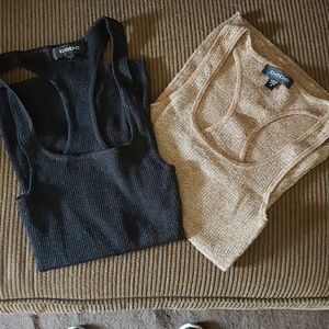 Two BeBe racer back tank tops