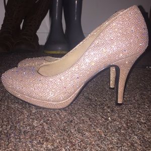 Gold sparkly high heels,