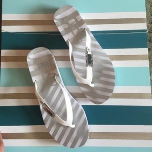 Guess platform flip flops