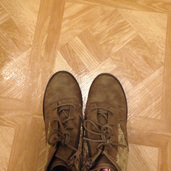 Dark green and off white combat boots.