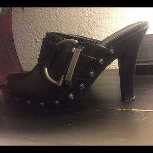 Black shoes. With studs along the bottom.