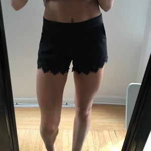 Cute black shorts with jagged lace trim