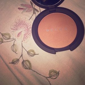 Becca blush in the shade of songbird.