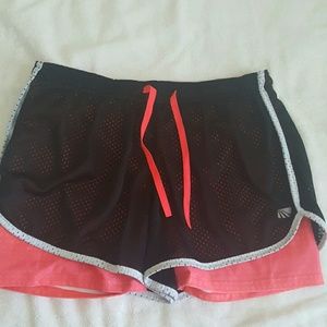 Mesh athletic shorts with compression shorts