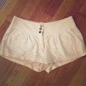 Just Ginger ivory colored button-up shorts