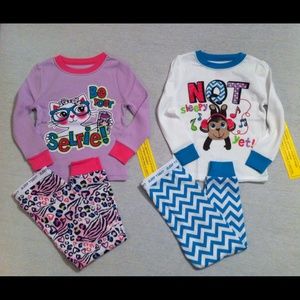 Girl's Long Sleeved Pajama Sets. Two sets included