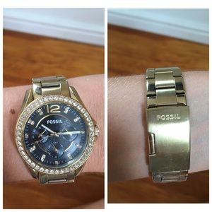 Gold fossil watch