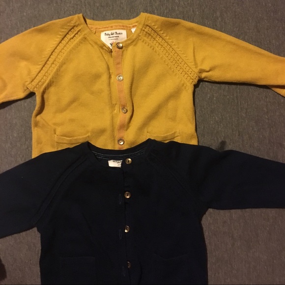 Two sweaters and a dress