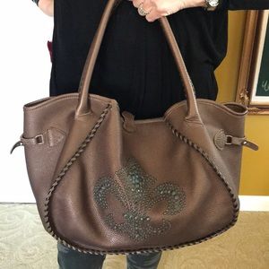 Tylie Malibu brown leather bag with stone details.