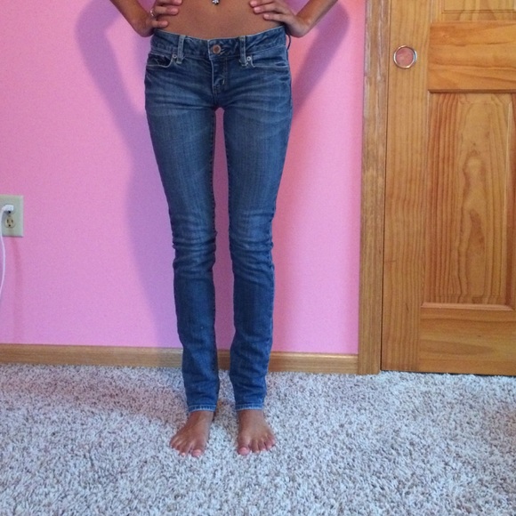 Low rise medium wash AE skinny jeans