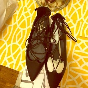 These super cute pointy tie up flats
