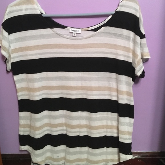 A flowy black and white shirt