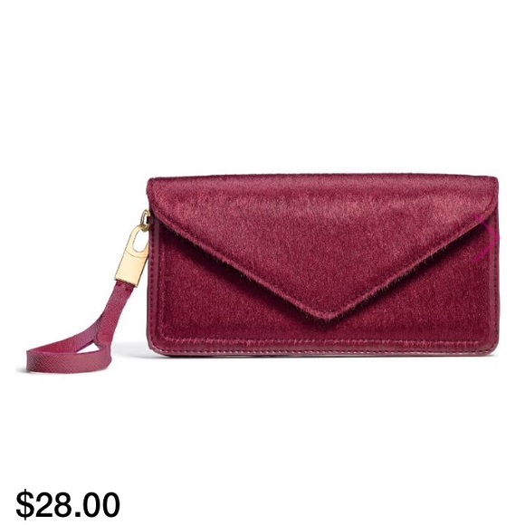 Mark.  Flick of the Wristlet