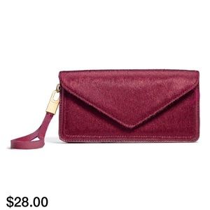 Mark. Flick of the Wristlet