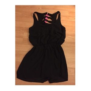 Black romper with hot pink detail